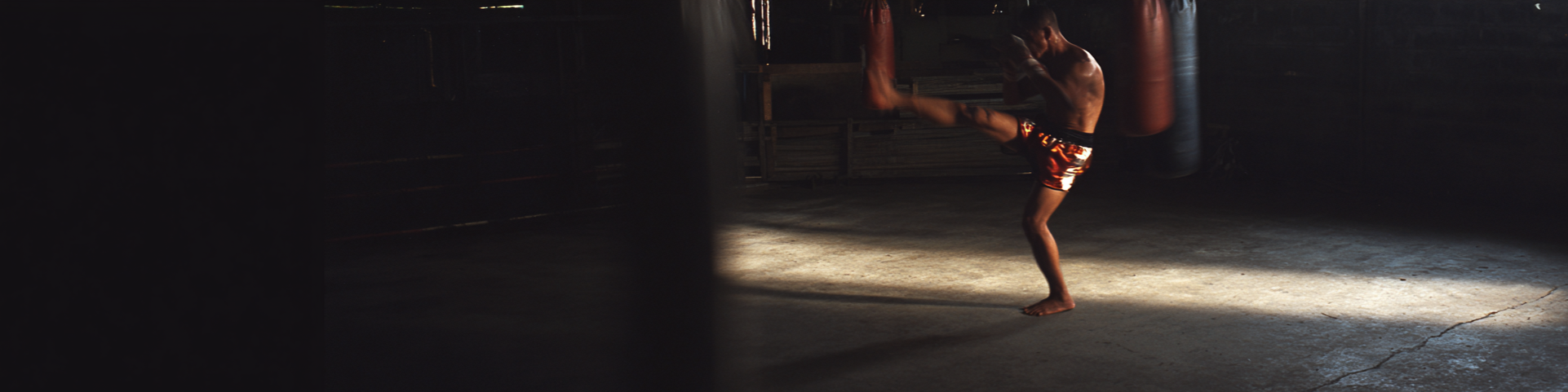 bittahspecialist_cinematic_still_gritty_2000s_Muay_Thai_fight_e991c31a-5ee5-4895-9218-537633cf5167_3.png